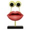 Figurine lips with yellow eyes