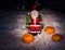 Figurine of Santa Claus with a delicious and ripe oranges for the dressing rooms to create new year and Christmas mood