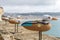 Figurines of seagulls with the image of Jacques-Yves Cousteau on the wall of the fortress in Nazare close up