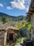 Fikardou village scene with traditional architecture and surrounding landscape