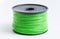 Filament for 3D Printer in light green against a bright background