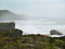 Filey brig waves crashing over the rocks