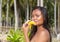 Filipina girl eating banana