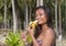 Filipina girl eating banana