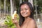 Filipina girl eating banana
