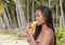 Filipina girl eating banana