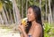 Filipina girl eating banana