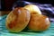 Filipino bread called Pan de Coco or bread roll filled with sweetened shredded coconut meat