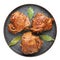 Filipino Chicken Adobo on dark gray plate isolated on white backdrop. Filipino food. Braised chicken thighs