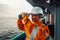 Filipino deck Officer on deck of vessel or ship , wearing PPE personal protective equipment