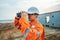 Filipino deck Officer on deck of vessel or ship , wearing PPE personal protective equipment