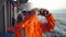 Filipino deck Officer on deck of vessel or ship , wearing PPE personal protective equipment