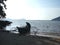 Filipino fisherman near his wooden boat.