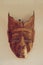 Filipino hand made, wooden tribal mask on the wall