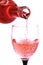 Fill a glass of rosÃ© on a white background