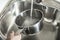 Fill a stainless steel saucepan with running water to bring to a boil