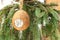 Filled Coconut Shell suet treats hanging at bird feeder