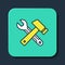 Filled outline Crossed hammer and wrench spanner icon isolated on blue background. Hardware tools. Turquoise square