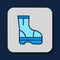 Filled outline Fire boots icon isolated on blue background. Vector