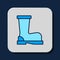 Filled outline Fire boots icon isolated on blue background. Vector