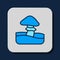 Filled outline Mushroom icon isolated on blue background. Vector