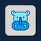 Filled outline Rhinoceros icon isolated on blue background. Animal symbol. Vector
