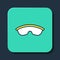 Filled outline Safety goggle glasses icon isolated on blue background. Turquoise square button. Vector