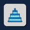 Filled outline Wedding cake icon isolated on blue background. Vector