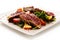 Fillet mignon - grilled beefsteaks with vegetables