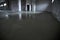 Filling the floor with concrete, screed and leveling the floor. Smooth floors made of a mixture of cement, industrial concreting