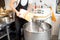 Filling flour into the kneader at the bakery