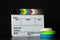 Film clapper board with colored marking tapes in internet content producer dark background studio