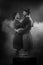 Film noir: romantic couple embracing