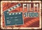 Film studio rusty metal plate with clapperboard