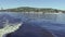 Filming from the stern of the ship. Summer river landscape. The Volga river in Saratov, Russia. The sound of the boat motor