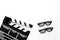 Filmmaker accessories. Clapperboard and glasses on white background top view copyspace