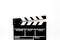 Filmmaker accessories. Clapperboard on white background top view copyspace