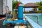 A filter pump cleans the pool water. Device for automatic cleaning of swimming pools