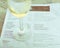 Filtered image wine taste concept with glass of dry white wine and tasting menu