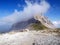 Final gondola lift pass Groste and shelter and Mount Groste a cloud band in the Brenta Dolomites