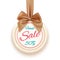 Final sale badge with golden ribbon and a bow