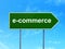 Finance concept: E-commerce on road sign background