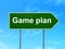 Finance concept: Game Plan on road sign background