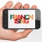 Finance concept: Hand Holding Smartphone with Franchising on display