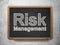 Finance concept: Risk Management on chalkboard