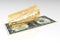 Finance. Dollar. Golden blade cuts bill. 3D render of a dollar with a blade