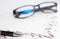 Finance, financial analysis, accounting accounts spreadsheet with pen glasses