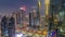 Financial center of Dubai city with luxury skyscrapers day to night timelapse, Dubai, United Arab Emirates