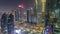 Financial center of Dubai city with luxury skyscrapers day to night timelapse, Dubai, United Arab Emirates