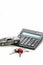 Financial Concepts of Car Loans and Credits. Composition of Scale Car and Keys against Calculator on Background.